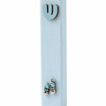 Wooden light blue baby boy mezuzah with tiny silver shoes and sparkling blue sequins for doorpost