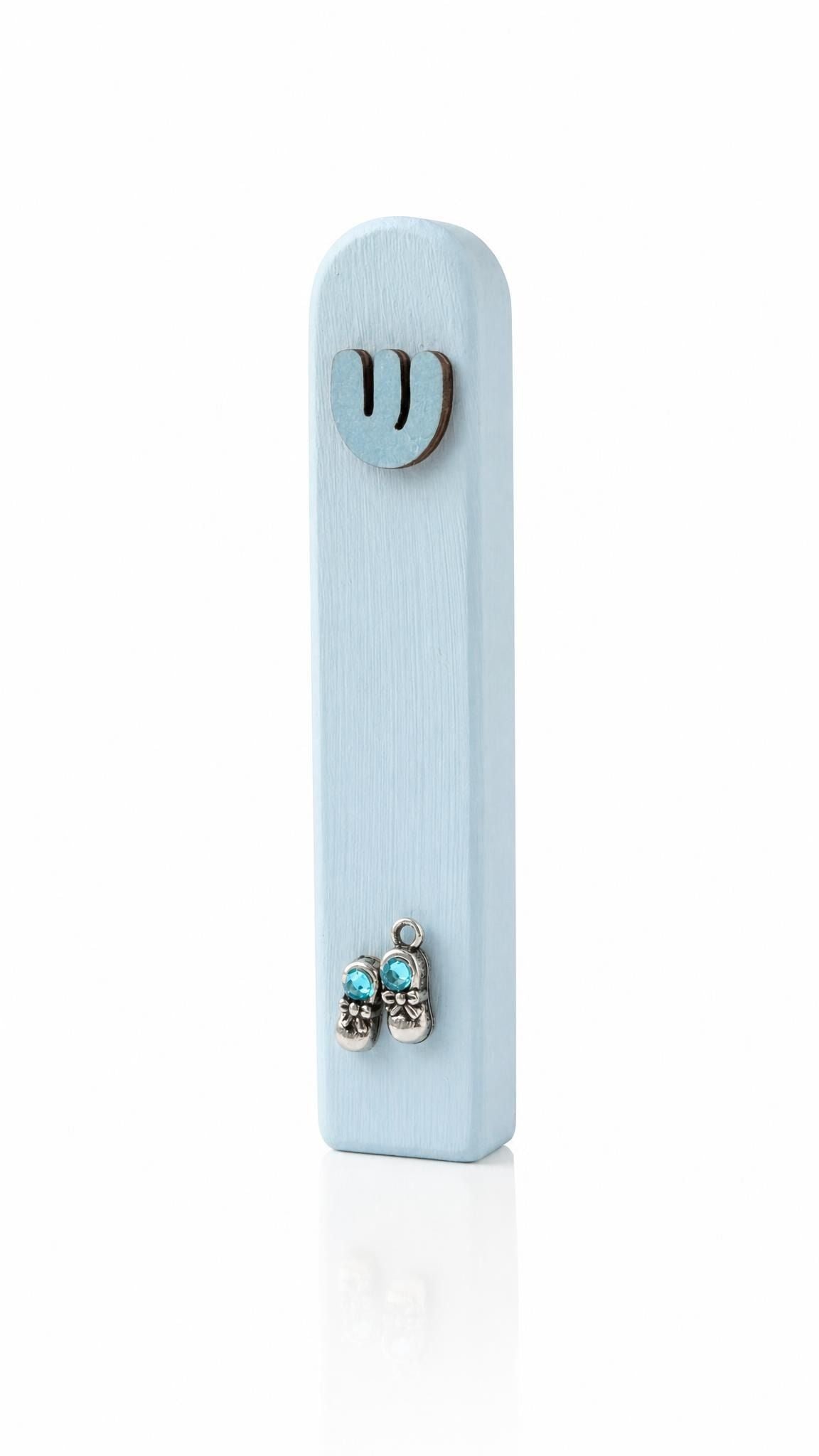Wooden light blue baby boy mezuzah with tiny silver shoes and sparkling blue sequins for doorpost