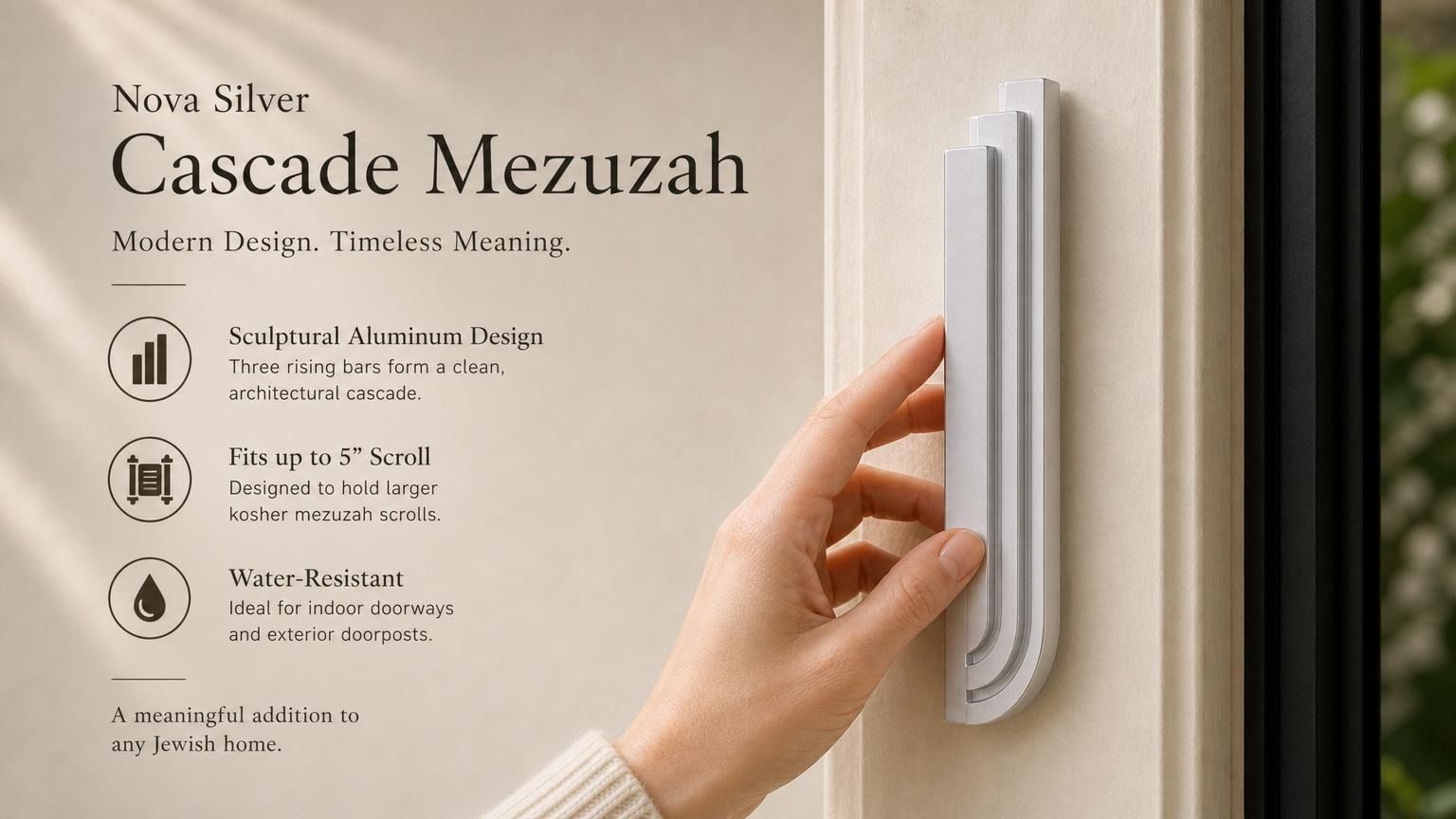 Person holding the Nova Silver Cascade Mezuzah showing its architectural aluminum design and dimensions in a lifestyle setting.