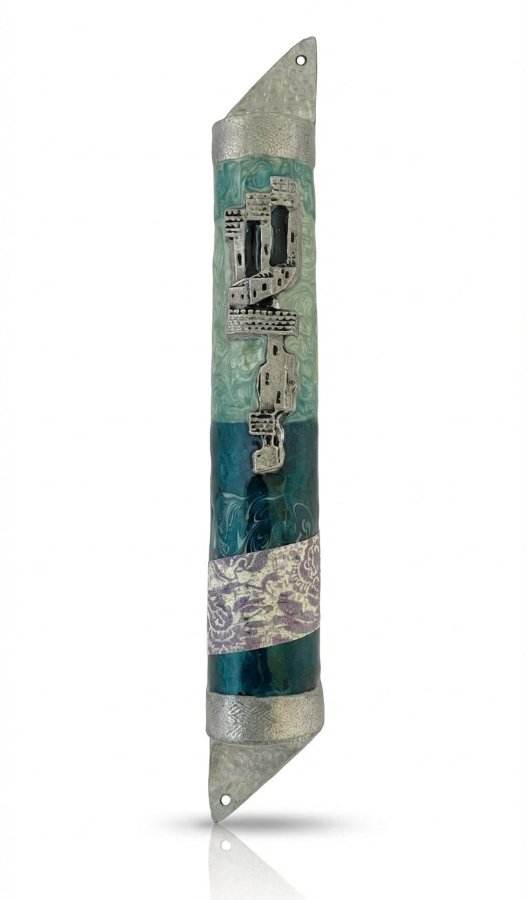High-resolution image of a beautifully crafted ocean-themed mezuzah with detailed engravings and decorative motifs on a white studio background with soft reflection.