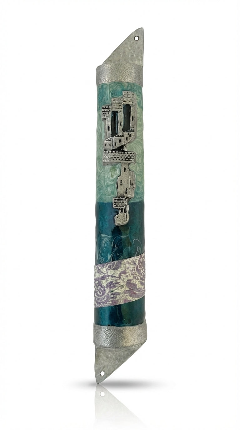 High-resolution image of a beautifully crafted ocean-themed mezuzah with detailed engravings and decorative motifs on a white studio background with soft reflection.