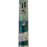 High-resolution image of a beautifully crafted ocean-themed mezuzah with detailed engravings and decorative motifs on a white studio background with soft reflection.