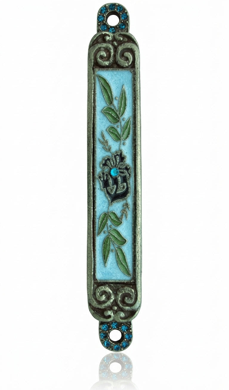 Hand-painted pewter Mezuzah with olive branches, crystal center, and intricate details on white background with soft reflection.