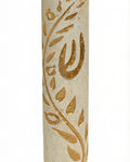 High-resolution image of a handcrafted Jerusalem stone Mezuzah with a golden olive branch design, on a bright white studio background with subtle reflection.