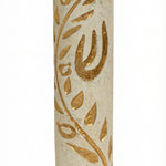 High-resolution image of a handcrafted Jerusalem stone Mezuzah with a golden olive branch design, on a bright white studio background with subtle reflection.
