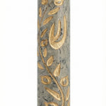 High-resolution image of a handcrafted Jerusalem stone Mezuzah with a golden olive branch design, set against a pure white background with a subtle reflection.