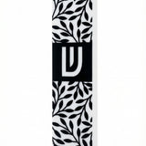 Upscale image of an olive branches mezuzah made of acrylic, with intricate details, Hebrew text, and decorative motifs, on a white studio background with soft reflection.