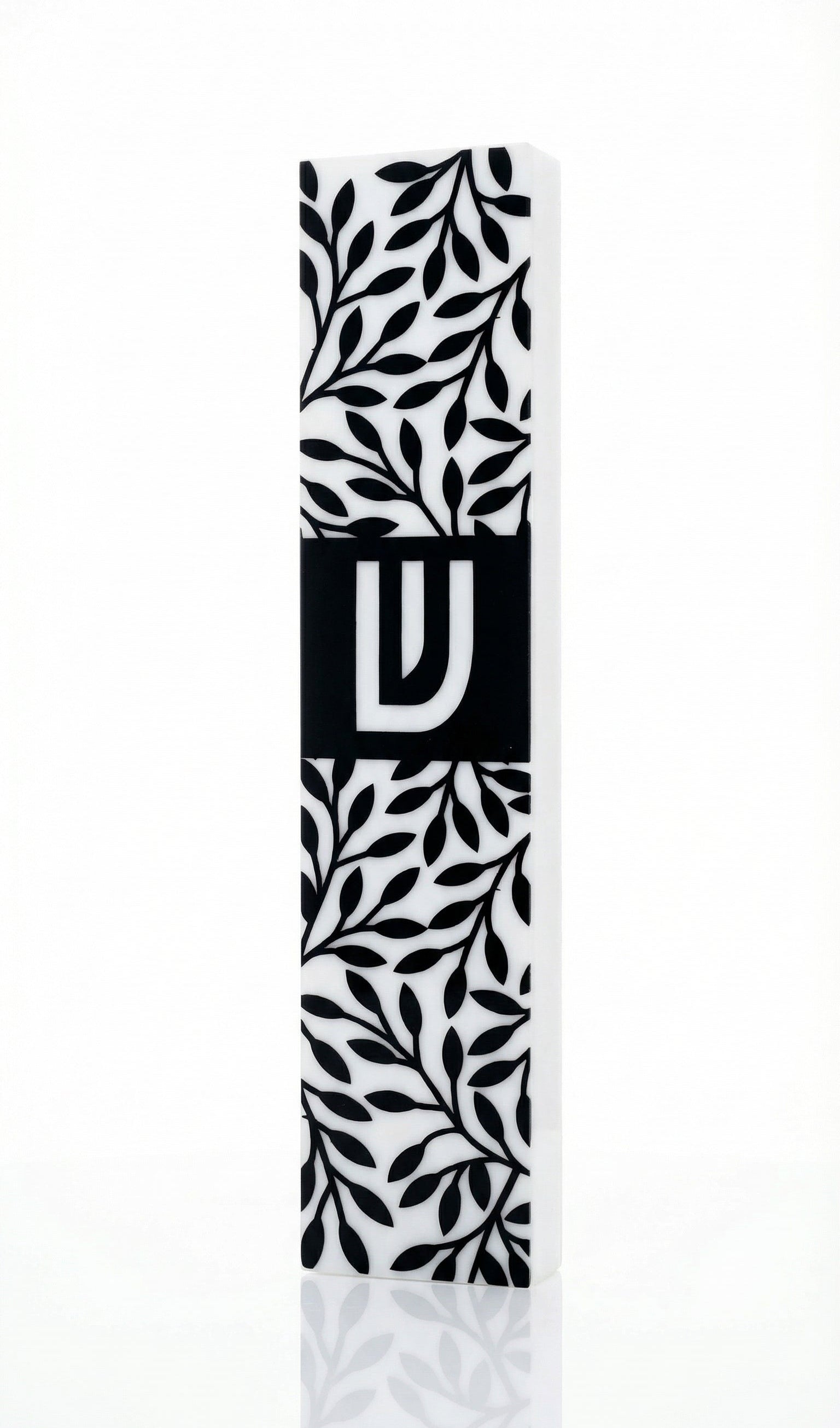 Upscale image of an olive branches mezuzah made of acrylic, with intricate details, Hebrew text, and decorative motifs, on a white studio background with soft reflection.