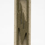 High-resolution image of an olive green Jerusalem stone mezuzah, showcasing fine surface details and texture on a white studio background with soft reflection.