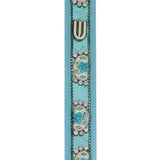 Bright metal mezuzah with paisley and floral motifs, 5-inch tall, designed for doorpost decoration, with detailed engravings and Hebrew script.
