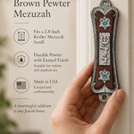 Pearlescent Kotel Heart brown pewter mezuzah being placed on a white doorpost with silver Shin and heart-shaped Star of David details