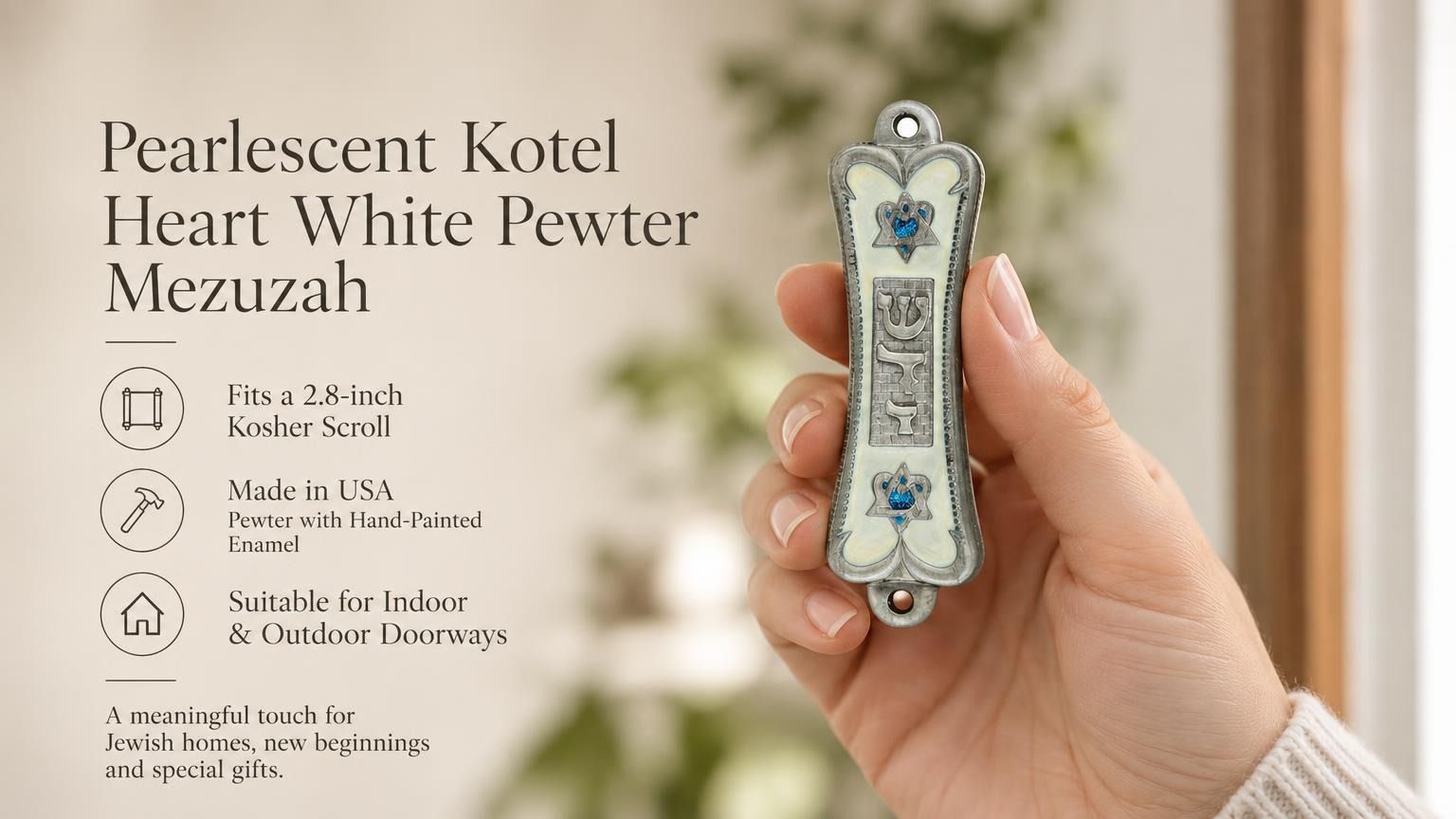 Hand holding Pearlescent Kotel Heart white pewter mezuzah case with silver Shin, blue accents and heart-shaped Stars of David