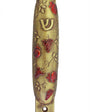 Brass mezuzah decorated with ripe pomegranate design, crafted by Israeli artist Emanuel, suitable for home doorways for Jewish tradition.