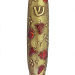 Brass mezuzah decorated with ripe pomegranate design, crafted by Israeli artist Emanuel, suitable for home doorways for Jewish tradition.