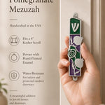 Person holding the precise mezuzah case at natural scale, showcasing its design, shape, and materials in a premium store setting.