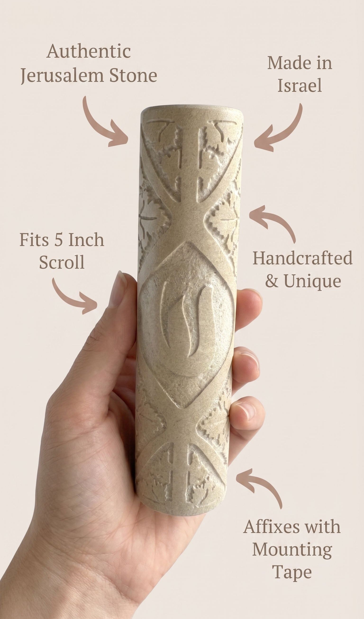 Person holding a Jerusalem Stone mezuzah, highlighting its natural material, craftsmanship, and traditional Jewish symbolism.