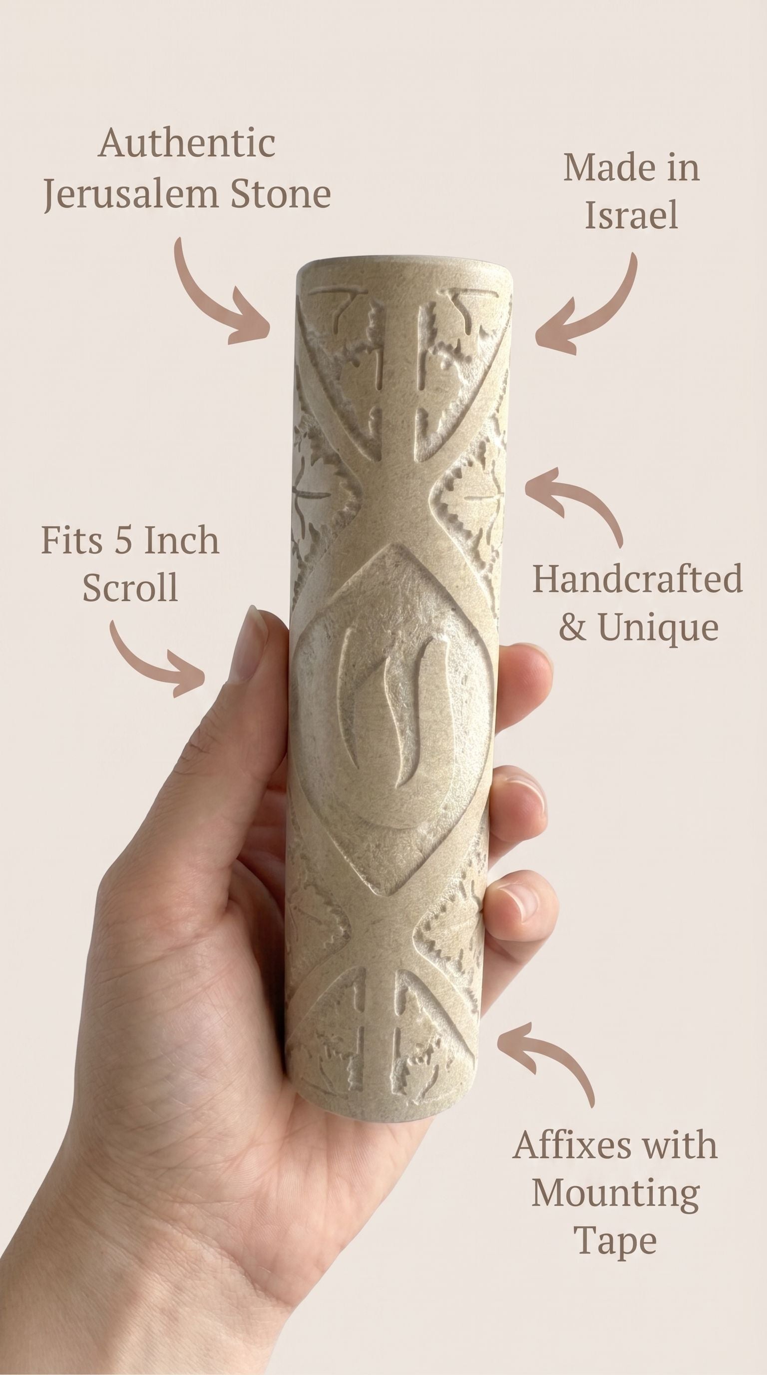 Person holding a Jerusalem Stone mezuzah, highlighting its natural material, craftsmanship, and traditional Jewish symbolism.