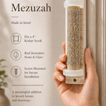 Person holding a Jerusalem Stone Mezuzah at realistic scale, showcasing precise shape, material, and engraved Shema prayer in a premium store setting.
