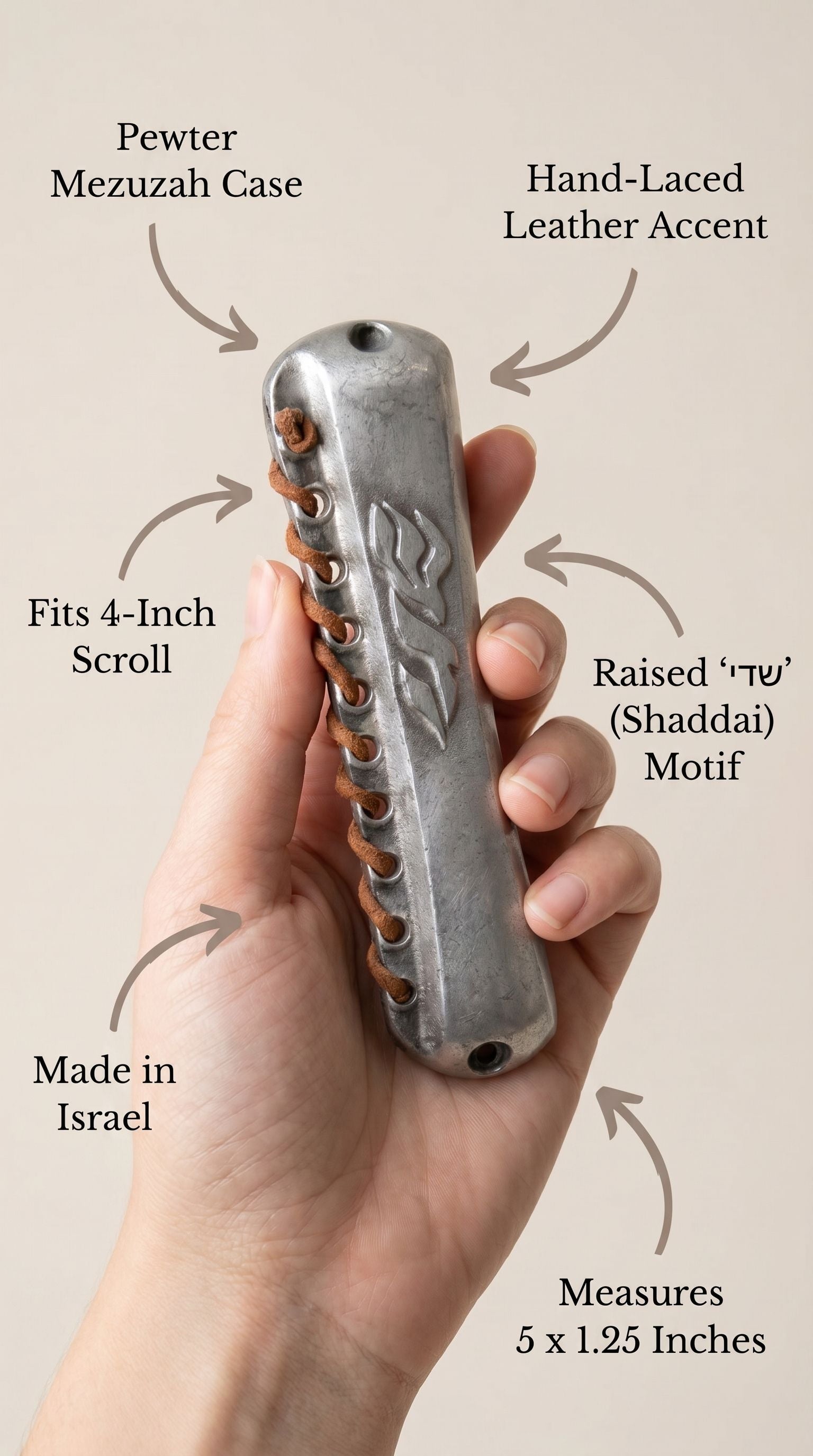 Person holding pewter mezuzah delicately with a support hand, showcasing artisanal craftsmanship and religious symbolism in a minimalist style.