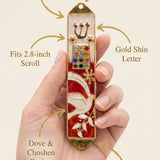 Minimalist callout image of a person holding the Twelve Jewels Dove Red Mezuzah, emphasizing the product's details and craftsmanship.