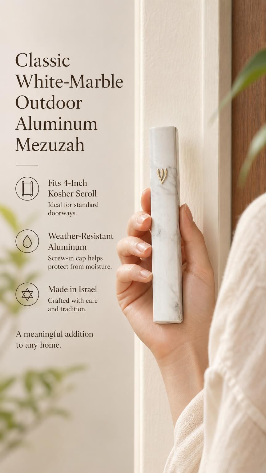 Person holding sleek white marble-inspired outdoor aluminum mezuzah with Hebrew Shin and gold accents.