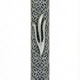 Elegant pewter filigree mezuzah with detailed design, showcased on a white studio background with soft reflection.