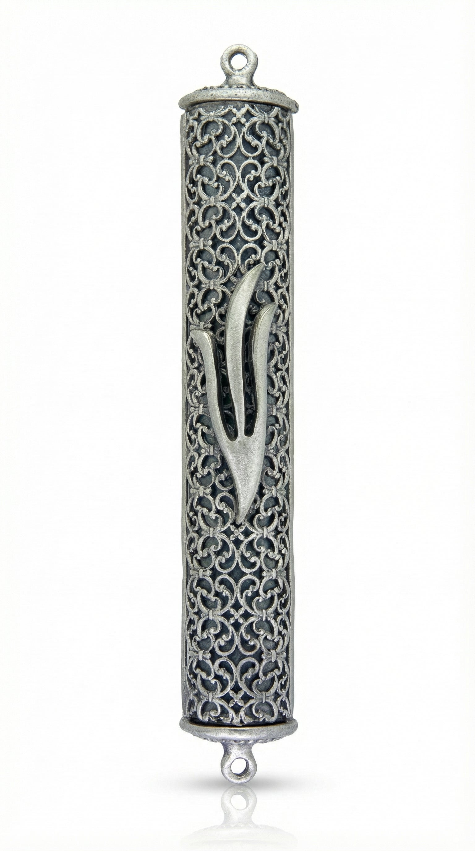 Elegant pewter filigree mezuzah with detailed design, showcased on a white studio background with soft reflection.