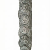 Detailed pewter mezuzah, 5 inches tall, with engraved Hebrew letters, decorative motifs, and a clear reflection on a white studio background.