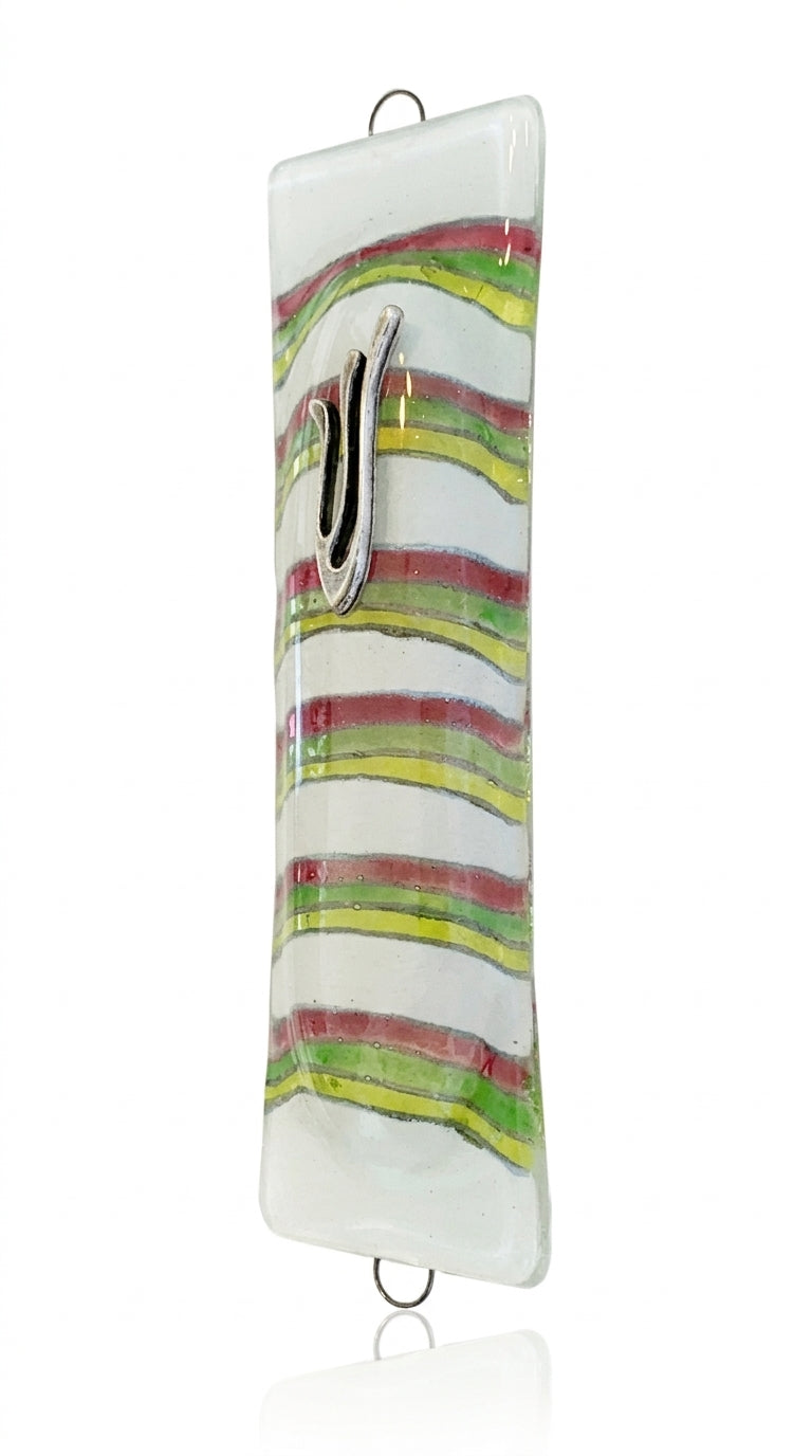 Elegant Phoenix glass mezuzah with Hebrew inscriptions, set against a pure white background with a soft reflection below.