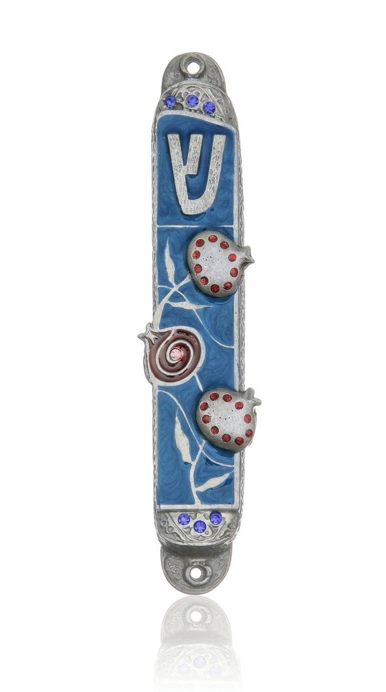 Pewter Mezuzah with artistic pomegranate design, hand-painted with enamel, displayed on a white studio background with subtle reflection.