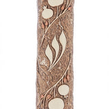 Detailed pomegranate motif Mezuzah designed by Israeli artist, symbolizing Jewish tradition and filled with Mitzvot, on a bright white background with soft reflection.
