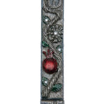 Detailed pomegranate mezuzah made of pewter with hand-painted enamel, featuring Hebrew inscriptions and decorative motifs, suitable for doorposts.