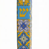 Upscale Portugal Mezuzah made of ceramic, detailed engravings and Hebrew text, displayed with clean white background and soft reflection.