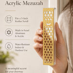 Elegant shot of a person presenting the gold acrylic mezuzah for showcase, emphasizing its design and craftsmanship.