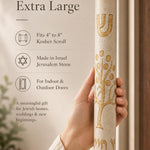 Close-up of the carved Tree of Life motif on the cream Jerusalem stone mezuzah.