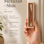 Person holding exact Jerusalem stone mezuzah in hand, showcasing natural texture and craftsmanship for a premium product display.