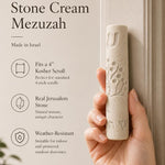 Person holding a Jerusalem stone mezuzah at realistic scale, emphasizing natural material and precise proportions for display.