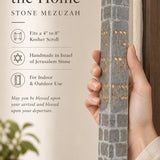 Close-up of the Jerusalem stone mezuzah with Hebrew blessing engraving, emphasizing its texture and design.