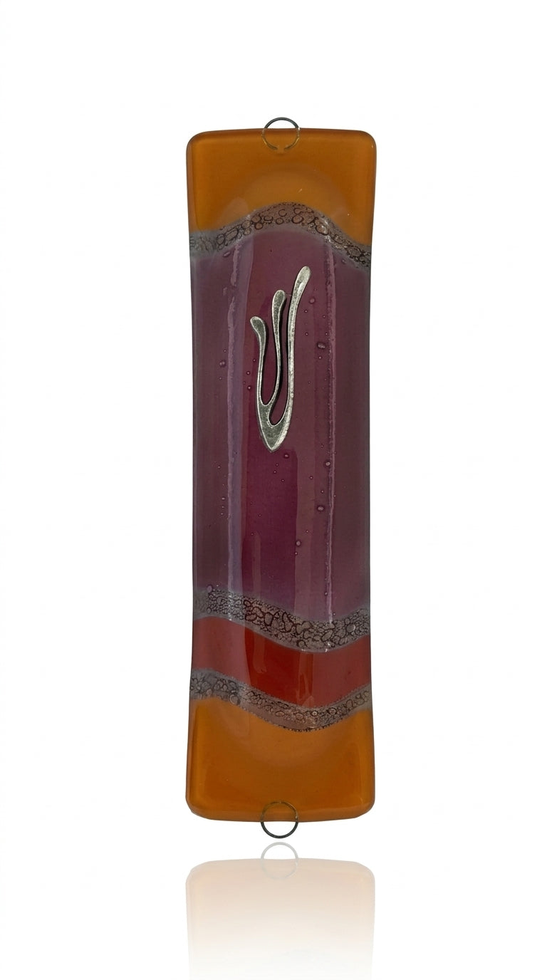 Elegant purple glass mezuzah measuring 4.5 inches with Hebrew inscriptions and decorative motifs, displayed on a white studio surface with light reflection.