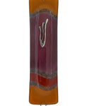 Elegant purple glass mezuzah measuring 4.5 inches with Hebrew inscriptions and decorative motifs, displayed on a white studio surface with light reflection.