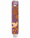 Decorative mezuzah case with floral and bird design on a white background