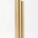 Upscale gold aluminum Pyramid Mezuzah with Hebrew inscriptions, detailed engravings, and polished surface, on a white studio background.