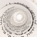 Handwritten parshiyos coiled inside the bayis, black STaM ink on klaf, ktav Alter Rebbe Rabbeinu Tam tefillin