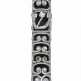 High-resolution image of a pewter Ram Mezuzah with curved ram horn shapes, accented with clear sequins, set against a bright white studio background with a subtle reflection.