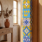 Hyper-realistic indoor scene showing a Portugal mezuzah mounted on a doorway in a personalized home setting.