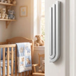 Mezuzah mounted on a residential doorpost in a natural indoor setting, showing true-to-life scale.