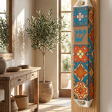 Authentic living space featuring a ceramic Mezuzah on doorframe, with warm lighting and home decor details.