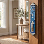 Interior room scene featuring a pewter mezuzah on a doorway, emphasizing natural lighting and realistic decor.