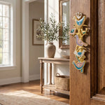 Lifestyle scene of a home interior featuring the Shalom Birds Mezuzah on the doorway, highlighting its decorative craftsmanship and placement.
