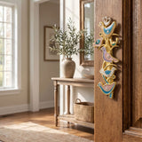 Lifestyle scene of a home interior featuring the Shalom Birds Mezuzah on the doorway, highlighting its decorative craftsmanship and placement.
